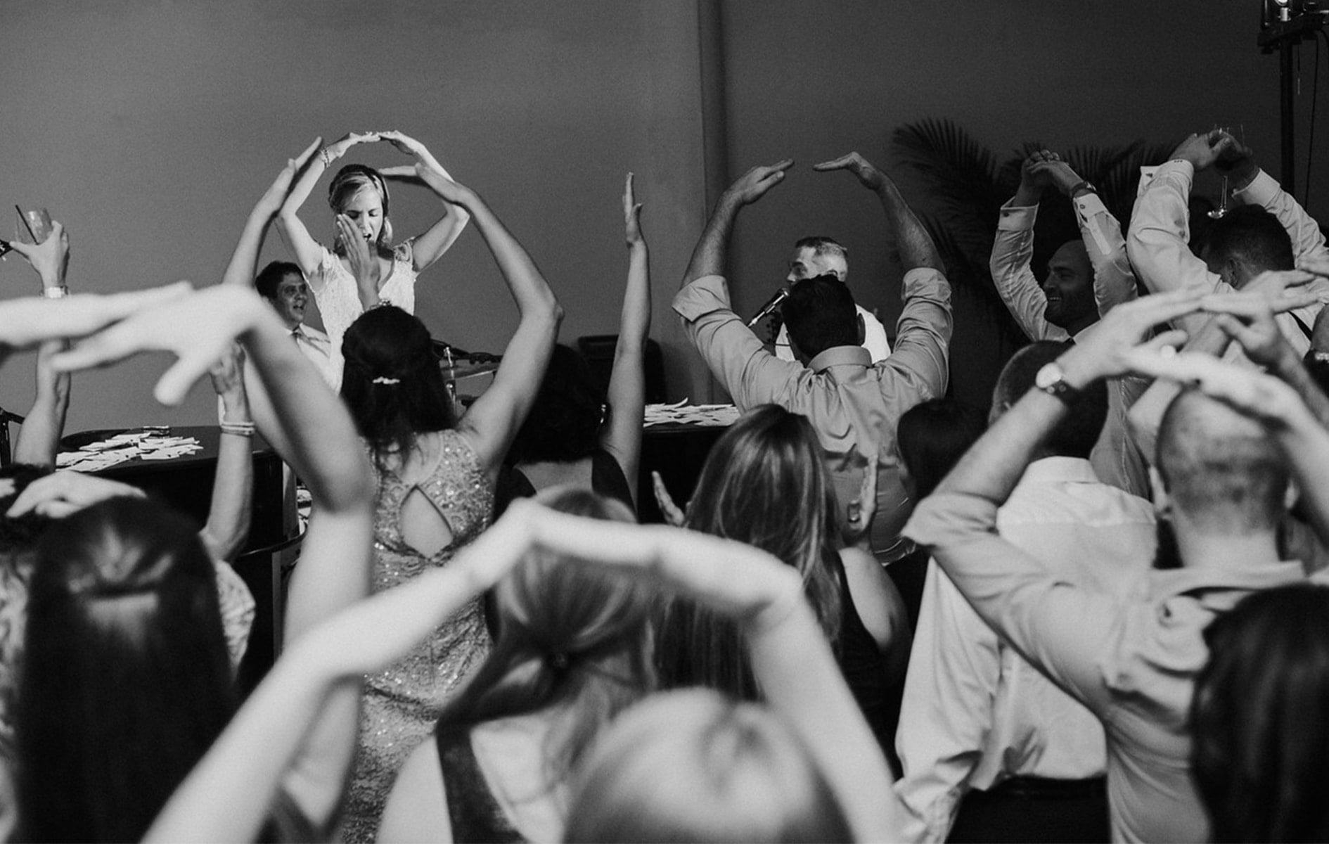 bride leading guests in ohio state university chant